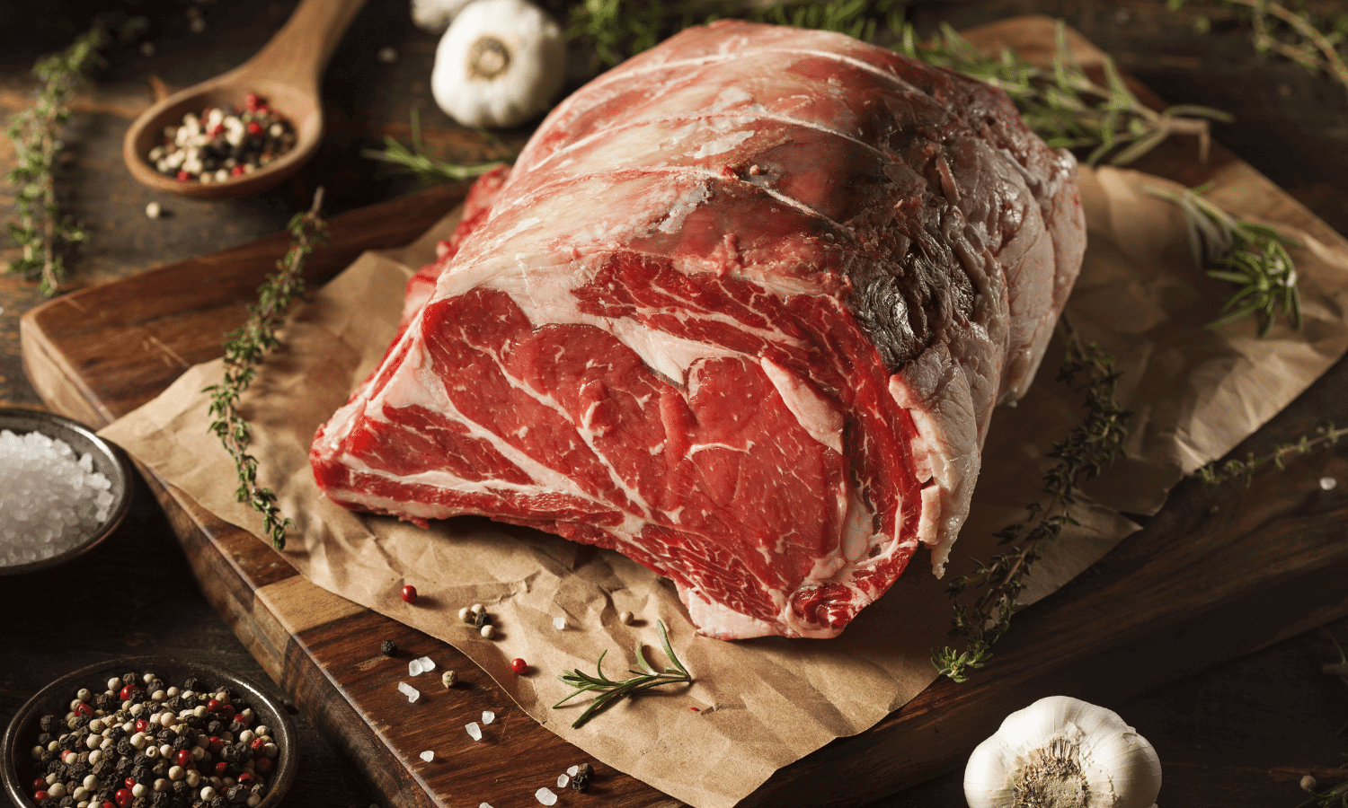 Prime Rib Roast Sitting On Cutting Stock Photo 125295725